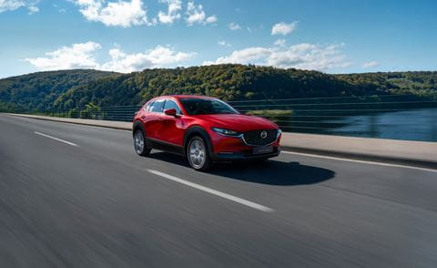 2025_CX-30_Sideshot01_nameplate_HighRes