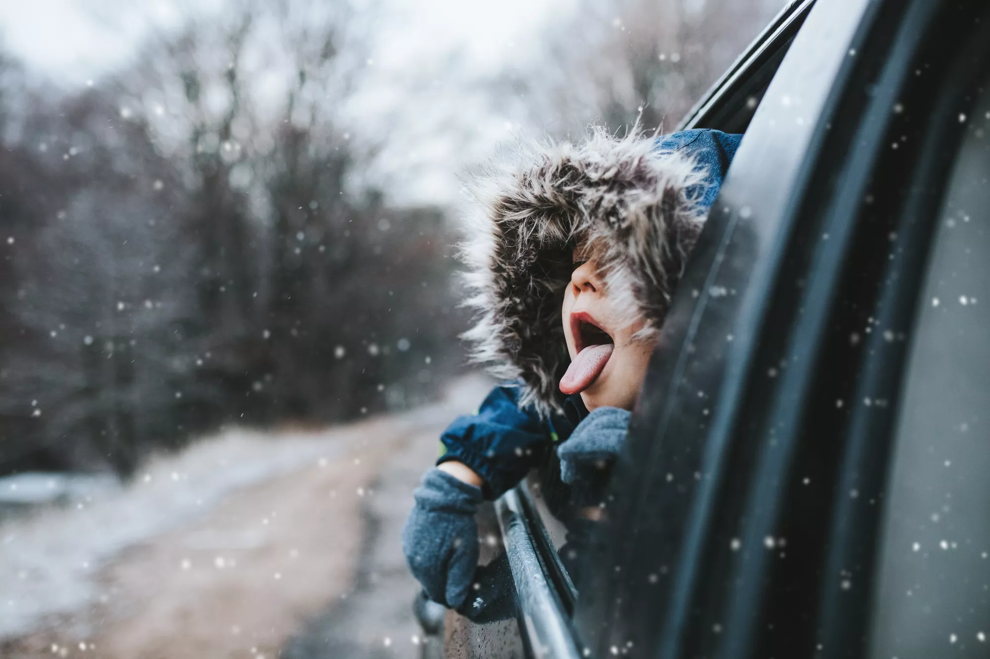 child-window-car-snow