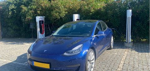 EV charging at Tesla super charger - cropped