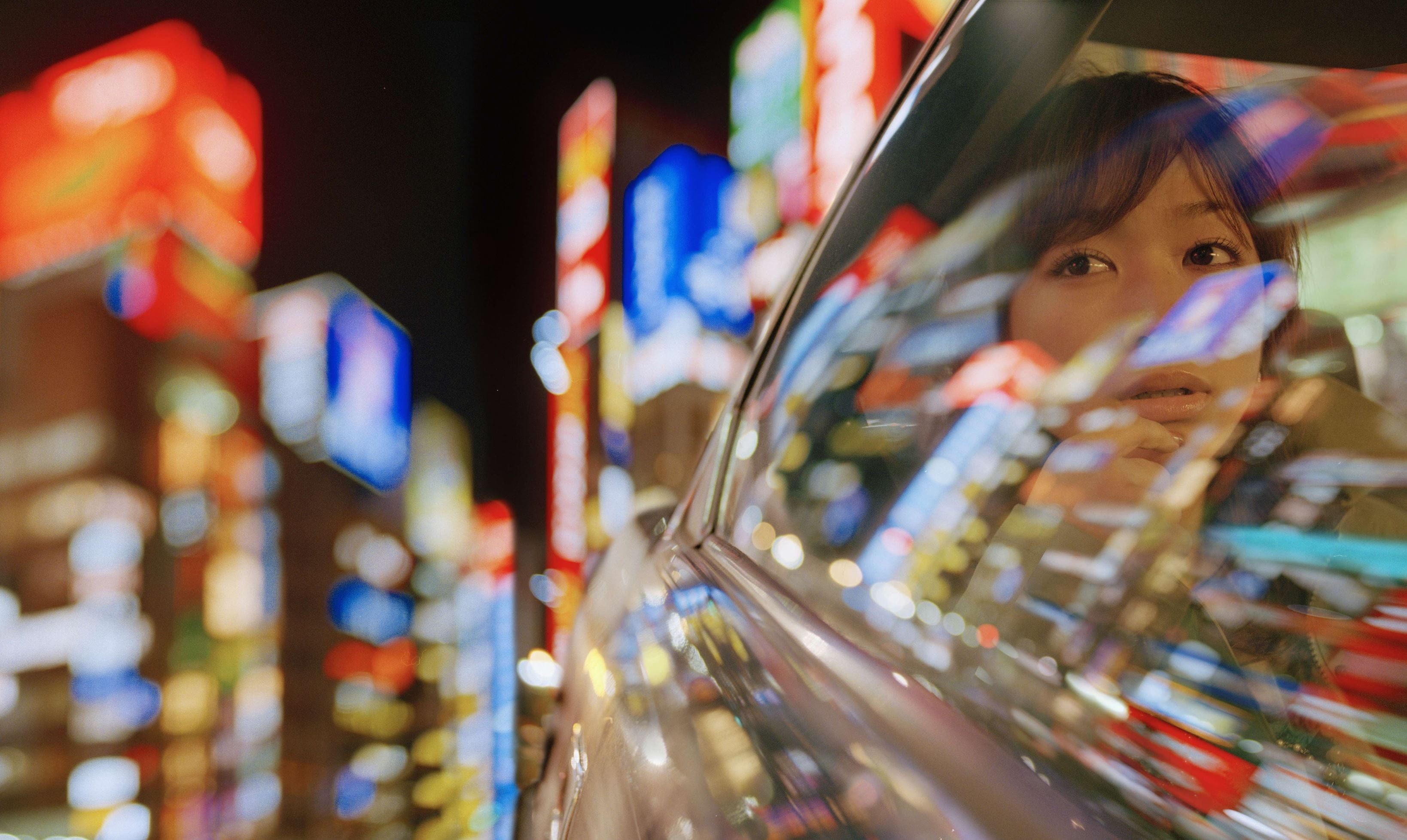 Woman_in_car_compressed