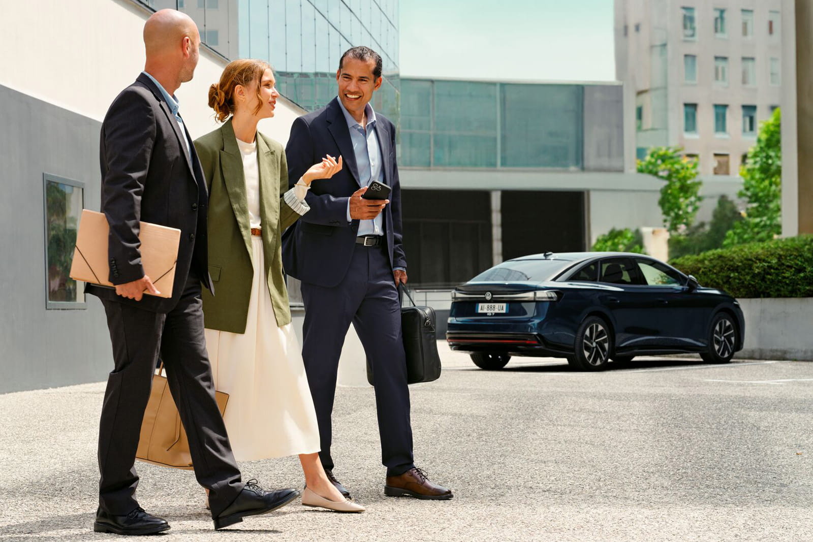 Business professionals with car