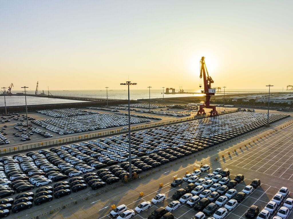 Parking lot with hundreds of cars