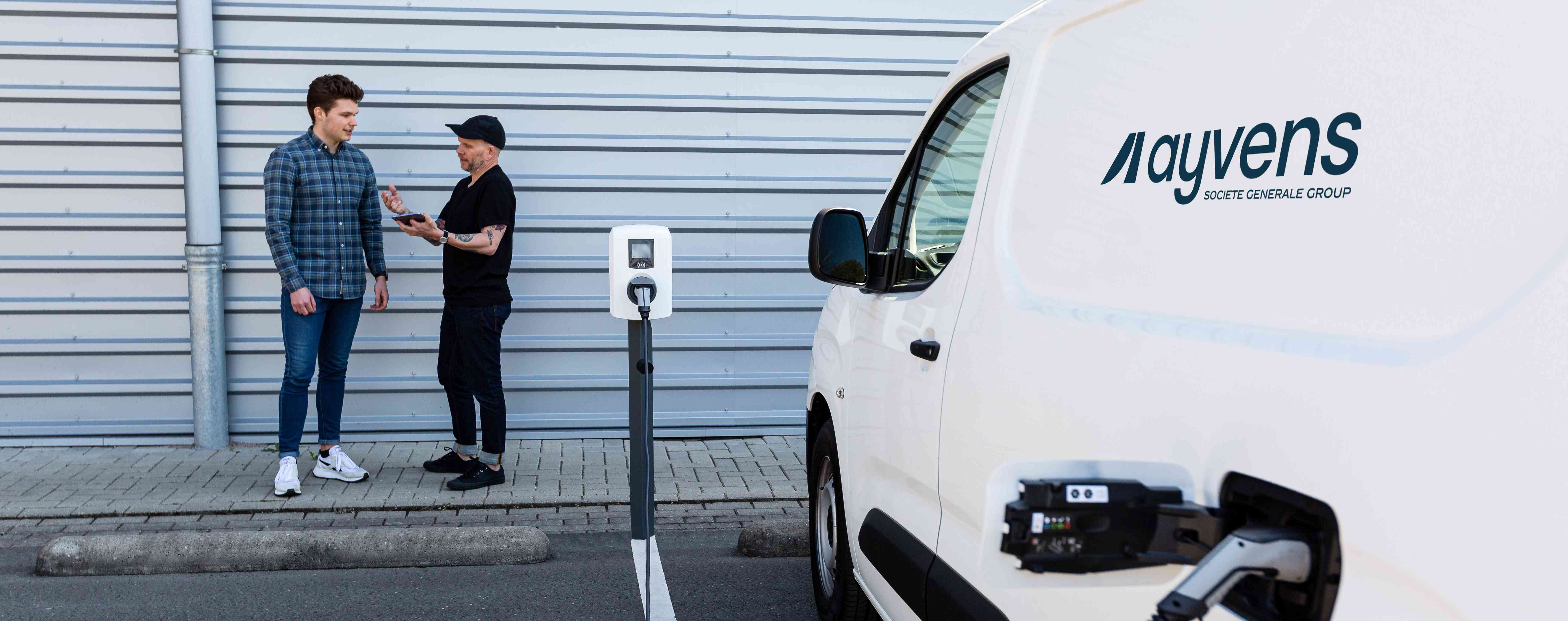 Electric van with Ayvens logo on it