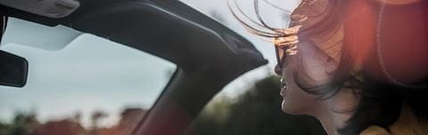 Hero-lady-inside-convertible-car