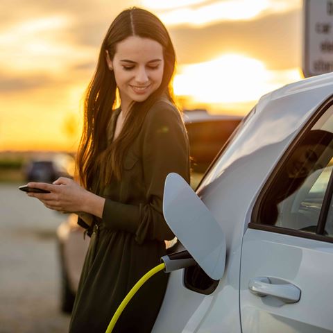 woman charging car